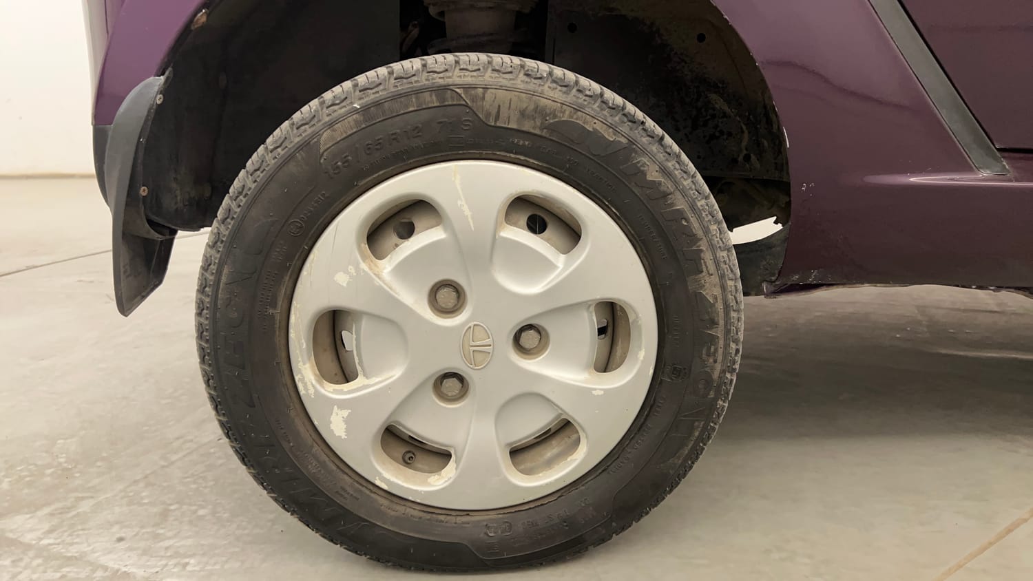 Used 2015 Tata Nano Twist XT Petrol Manual tyres RIGHT REAR TYRE RIM VIEW