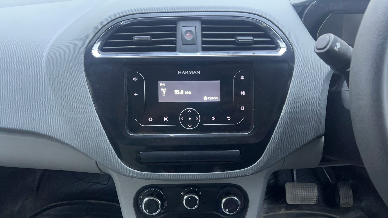 Used 2022 Tata Tigor XMA Petrol Automatic interior MUSIC SYSTEM & AC CONTROL VIEW
