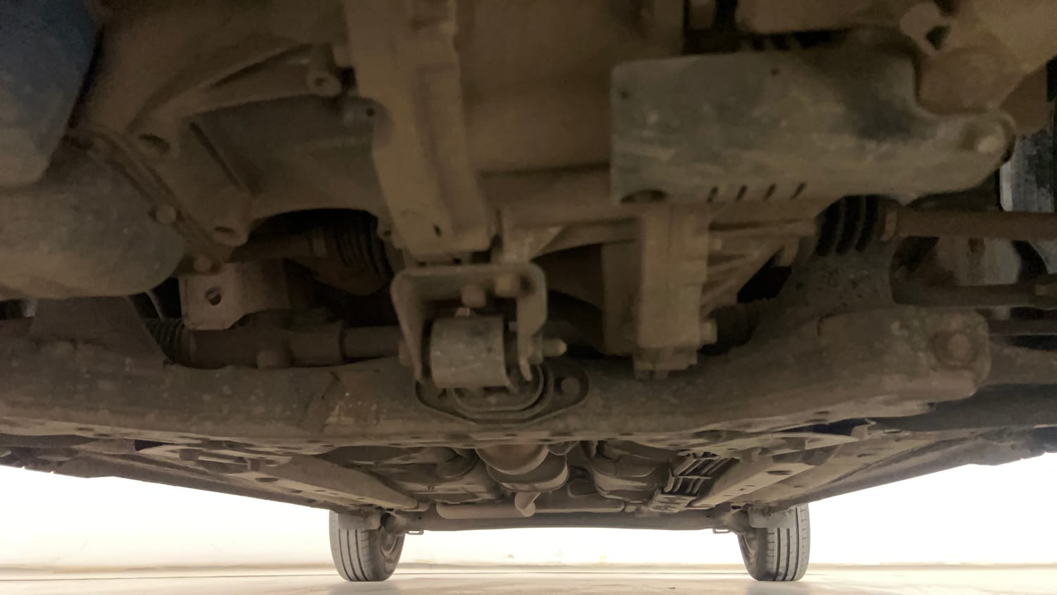 Used 2021 Hyundai Grand i10 Nios Sportz AMT 1.2 Kappa VTVT Petrol Automatic extra FRONT LEFT UNDERBODY VIEW