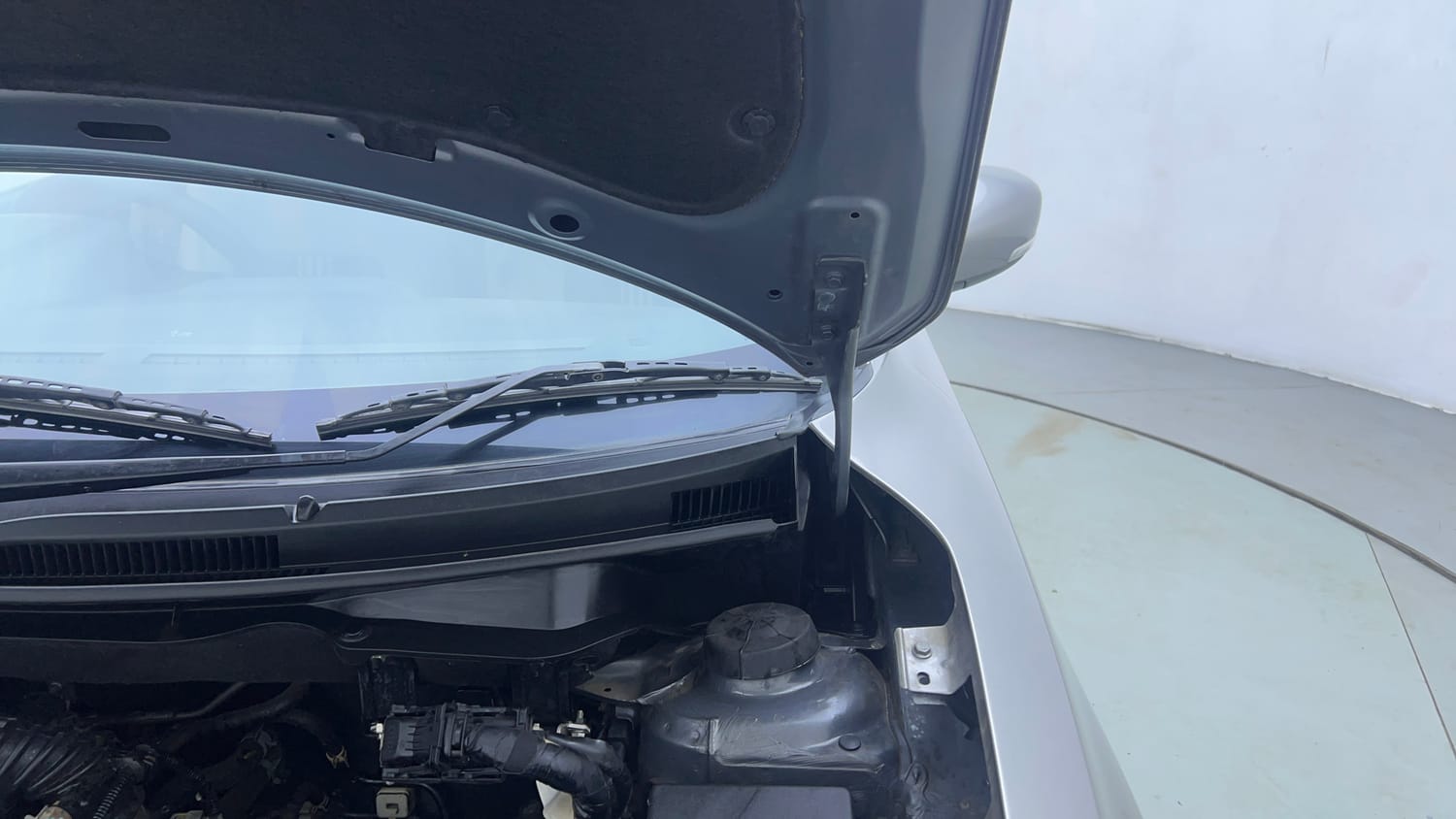 Used 2021 Maruti Suzuki Dzire VXi AGS Petrol Automatic engine ENGINE LEFT SIDE HINGE & APRON VIEW
