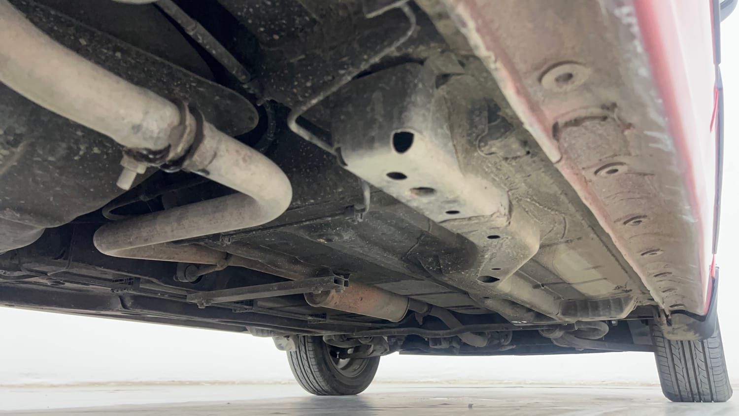 Used 2017 Tata Tiago Revotron XE (O) Petrol Manual extra REAR RIGHT UNDERBODY VIEW