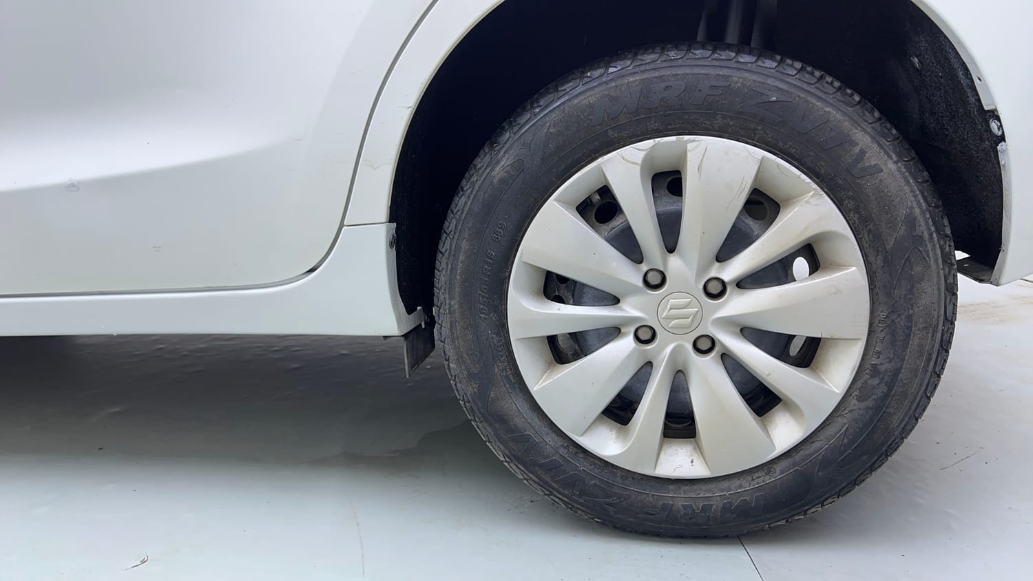 Used 2018 Maruti Suzuki Baleno Delta 1.2 Petrol Manual tyres LEFT REAR TYRE RIM VIEW