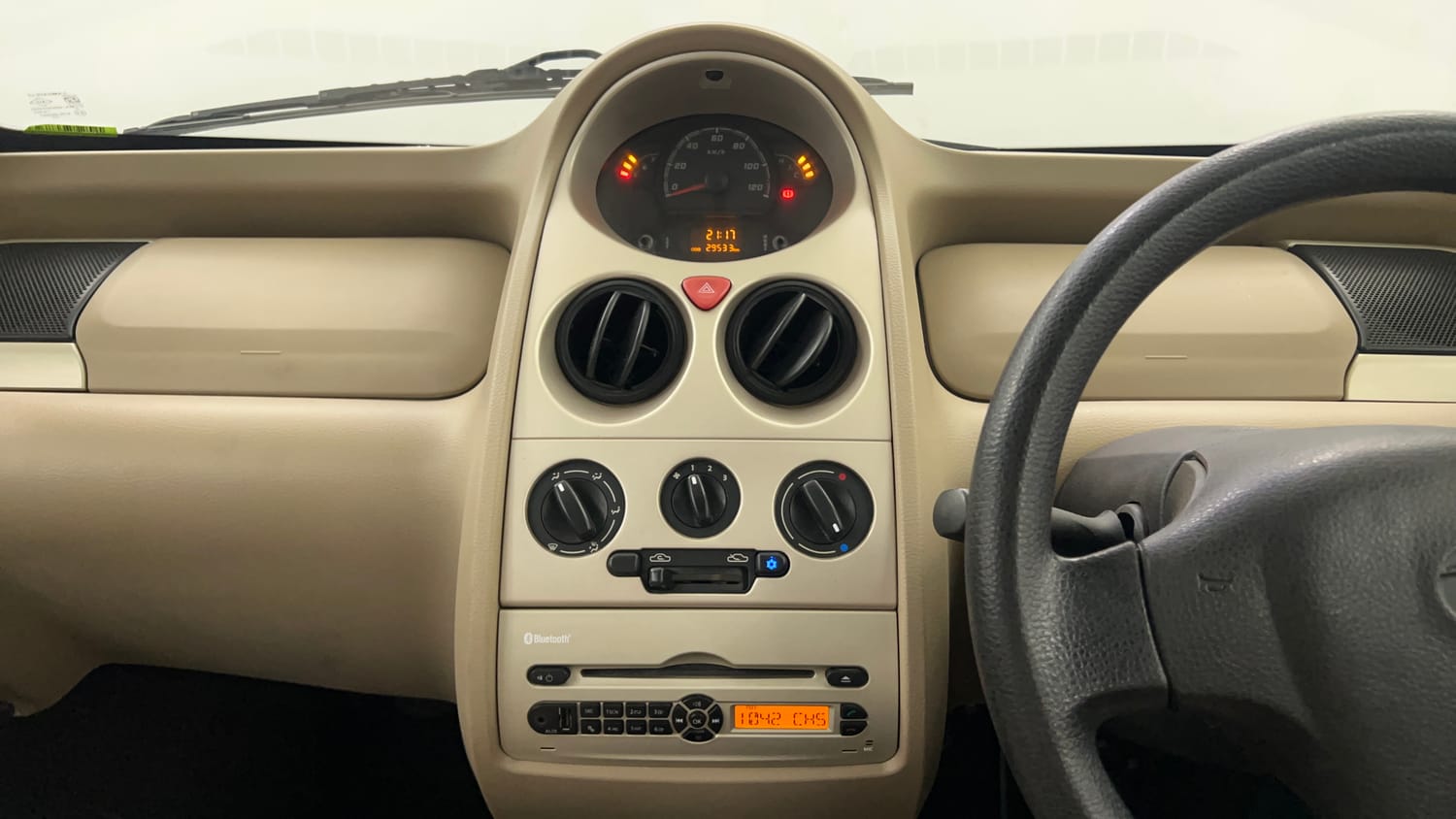 Used 2015 Tata Nano Twist XT Petrol Manual interior MUSIC SYSTEM & AC CONTROL VIEW