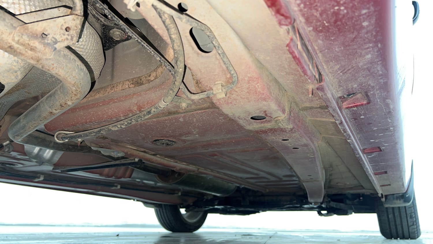 Used 2021 Toyota Glanza G CVT Petrol Automatic extra REAR RIGHT UNDERBODY VIEW