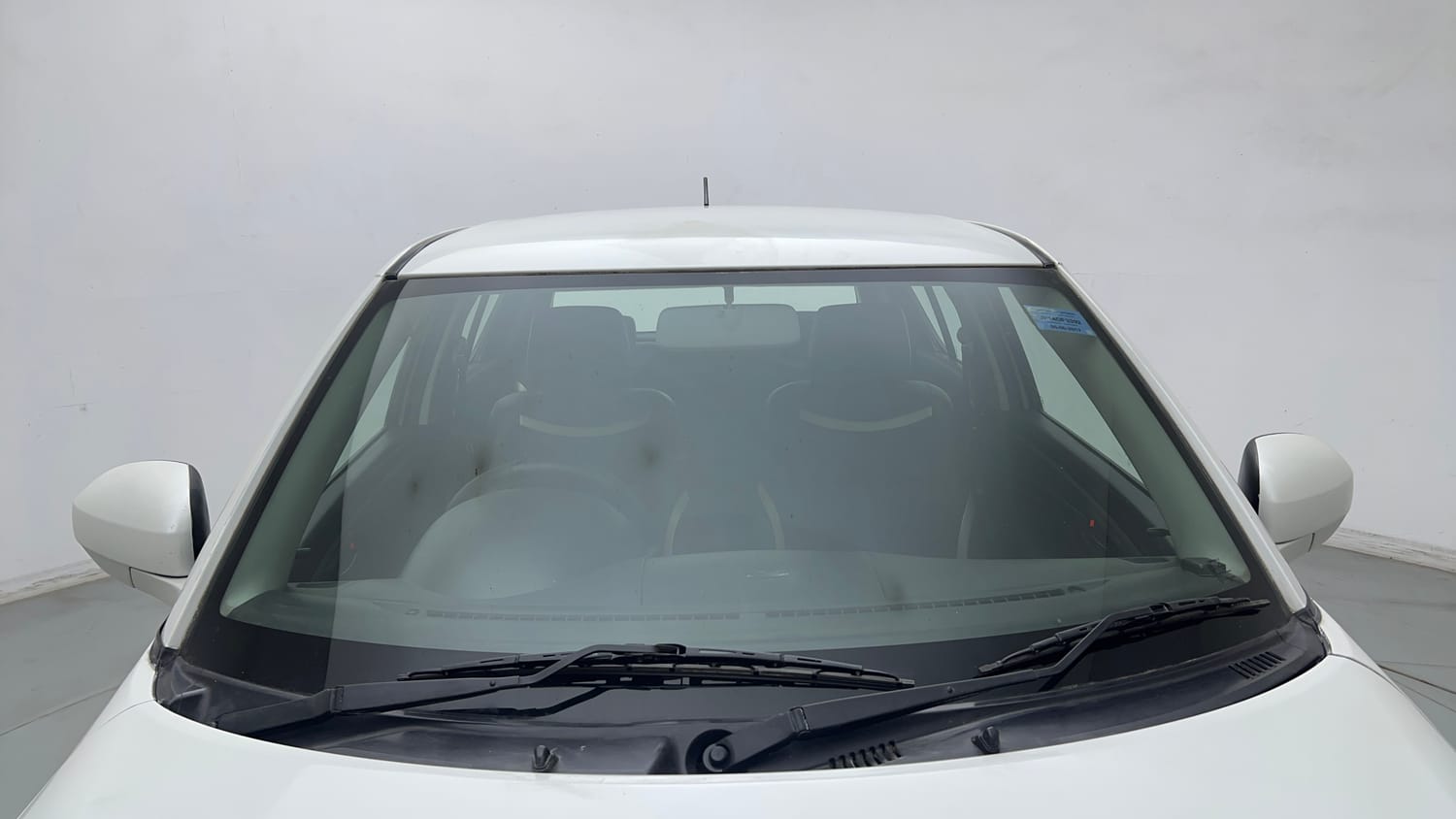 Used 2017 Maruti Suzuki Swift Lxi (O) Petrol Manual exterior FRONT WINDSHIELD VIEW