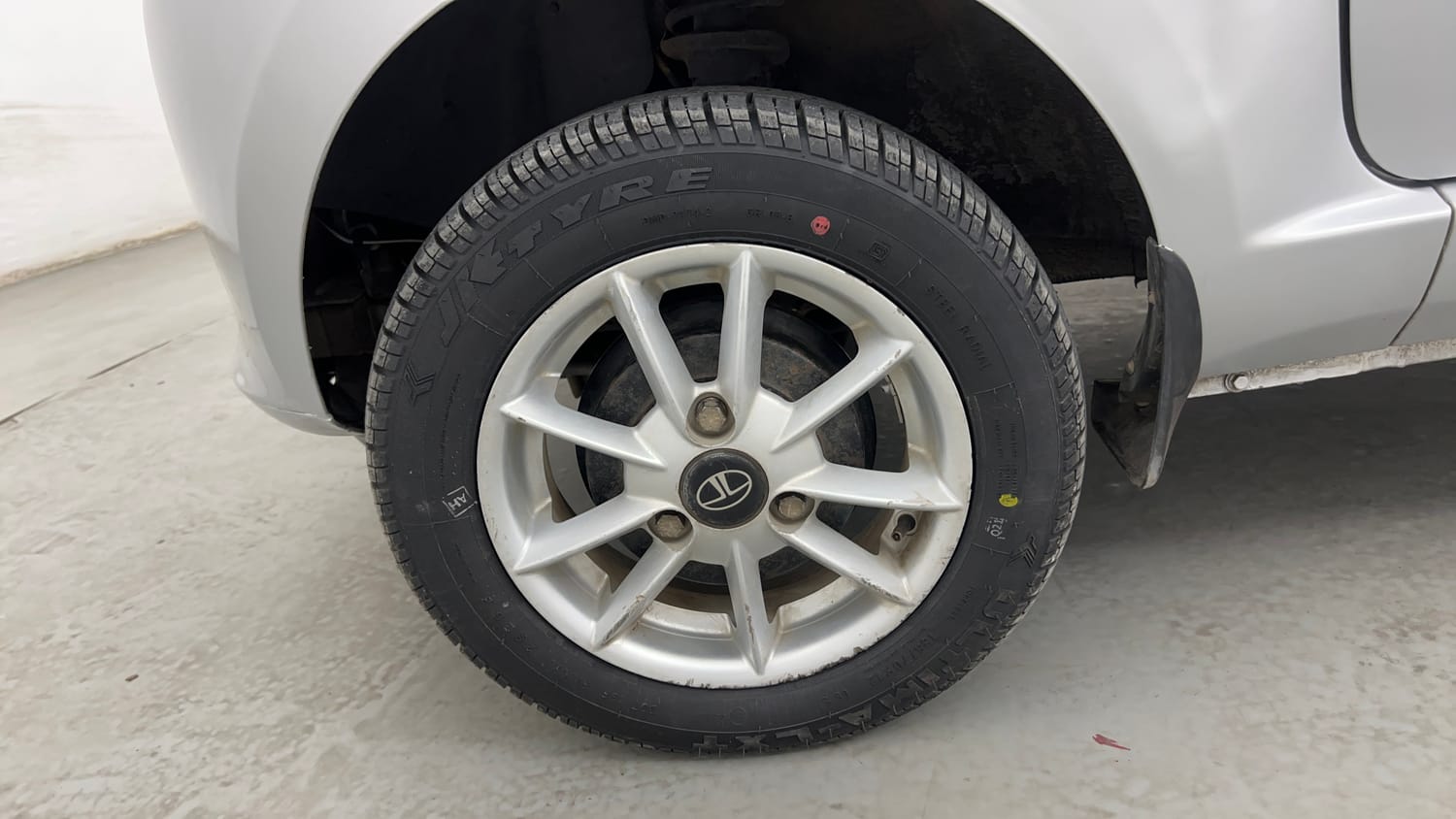 Used 2015 Tata Nano Twist XTA Petrol Automatic tyres LEFT FRONT TYRE RIM VIEW