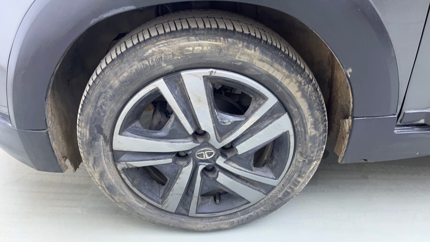 Used 2023 Tata Tiago NRG XZ AMT Petrol Automatic tyres LEFT FRONT TYRE RIM VIEW