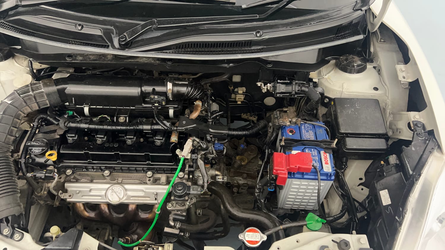 Used 2021 Maruti Suzuki Dzire VXi Petrol Manual engine ENGINE LEFT SIDE VIEW