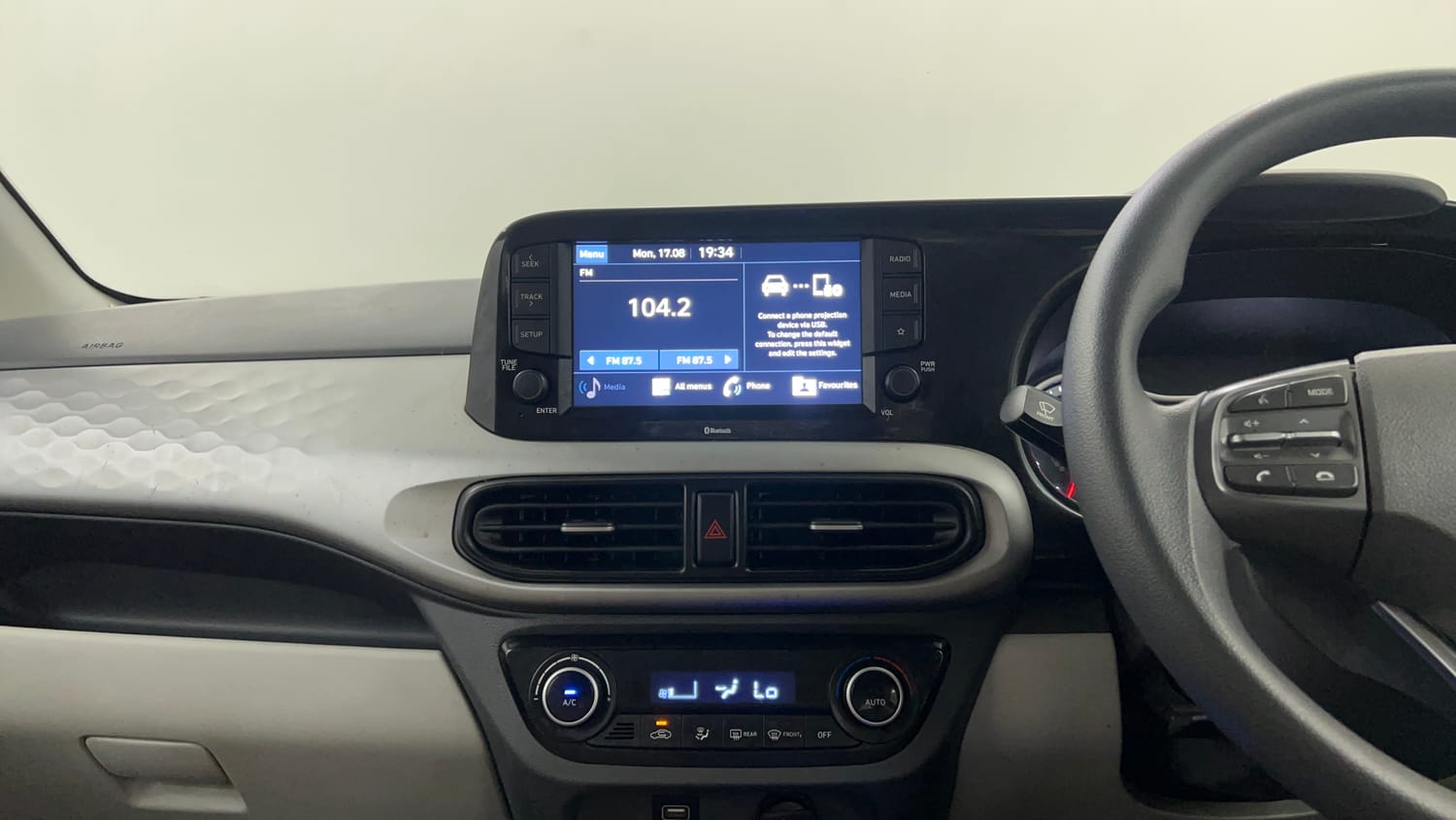 Used 2021 Hyundai Grand i10 Nios Sportz AMT 1.2 Kappa VTVT Petrol Automatic interior MUSIC SYSTEM & AC CONTROL VIEW