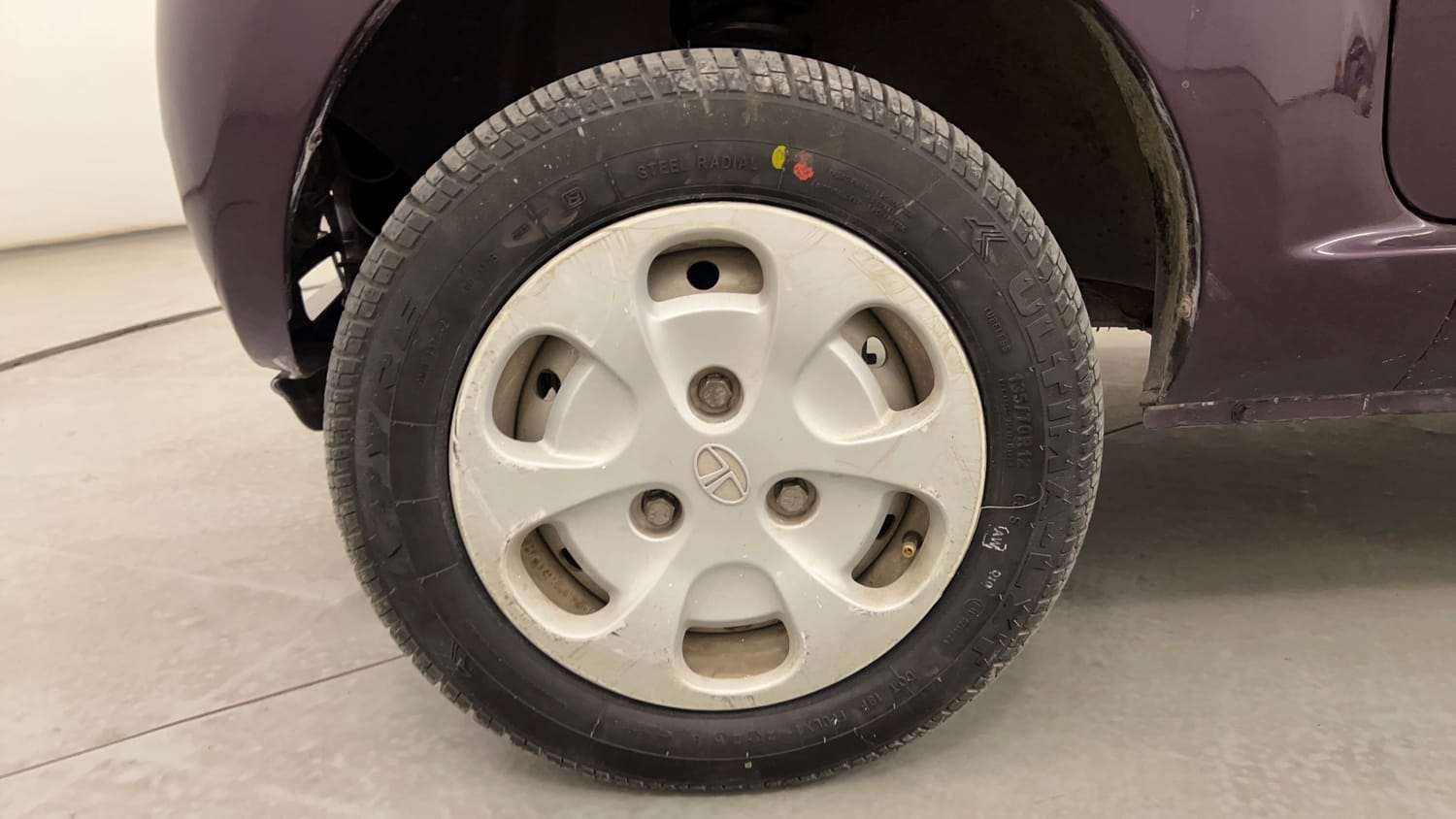 Used 2015 Tata Nano Twist XT Petrol Manual tyres LEFT FRONT TYRE RIM VIEW