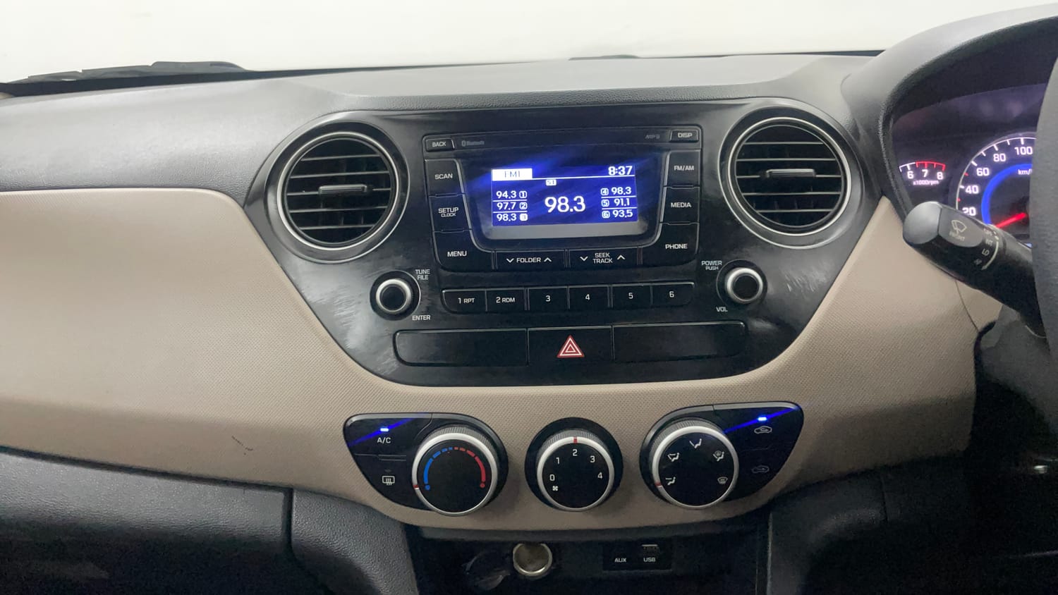 Used 2016 Hyundai Grand i10 Sportz 1.2 Kappa VTVT Petrol Manual interior MUSIC SYSTEM & AC CONTROL VIEW