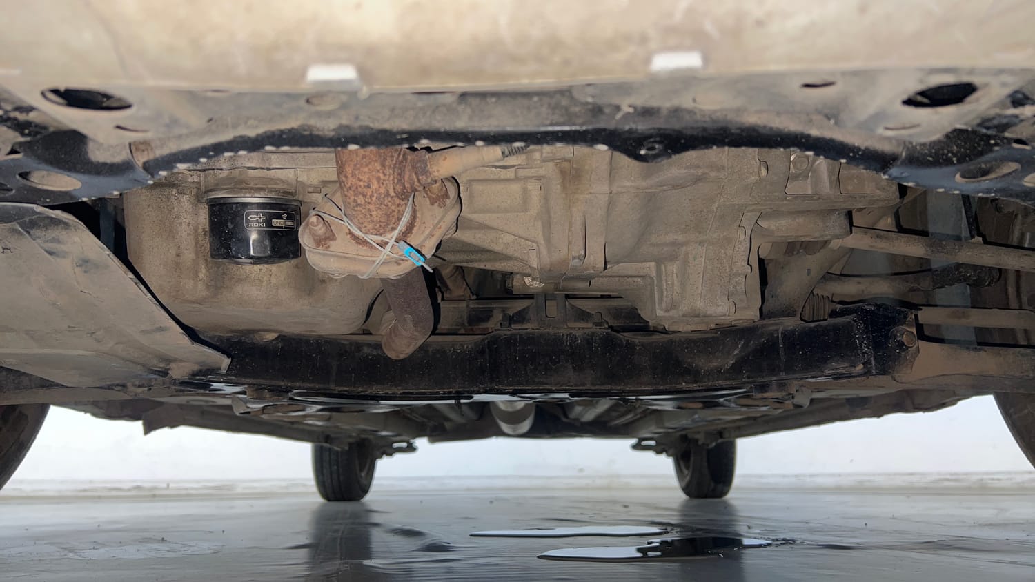 Used 2017 Maruti Suzuki Swift Lxi (O) Petrol Manual extra FRONT LEFT UNDERBODY VIEW