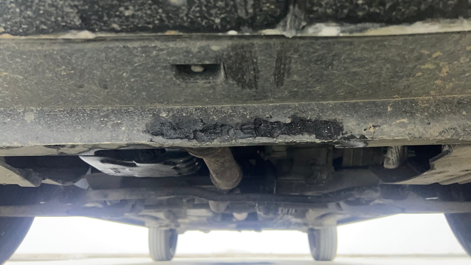 Used 2022 Tata Tigor XMA Petrol Automatic extra FRONT LEFT UNDERBODY VIEW