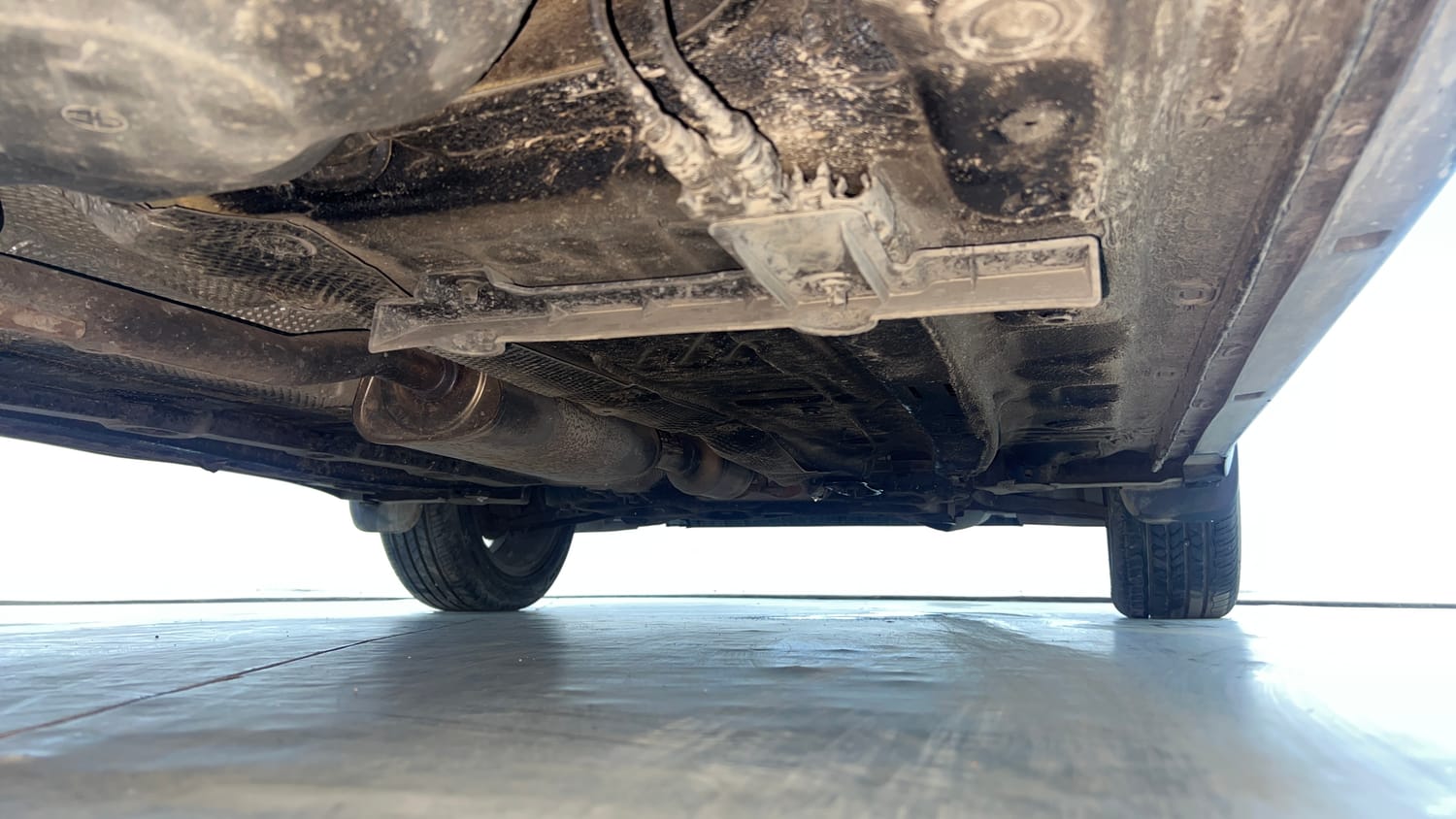 Used 2022 Volkswagen Taigun Topline 1.0 TSI MT Petrol Manual extra REAR RIGHT UNDERBODY VIEW