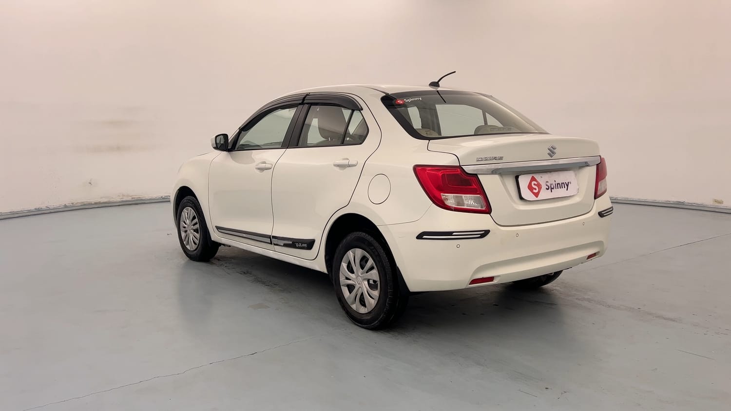Used 2021 Maruti Suzuki Dzire VXi Petrol Manual exterior LEFT REAR CORNER VIEW