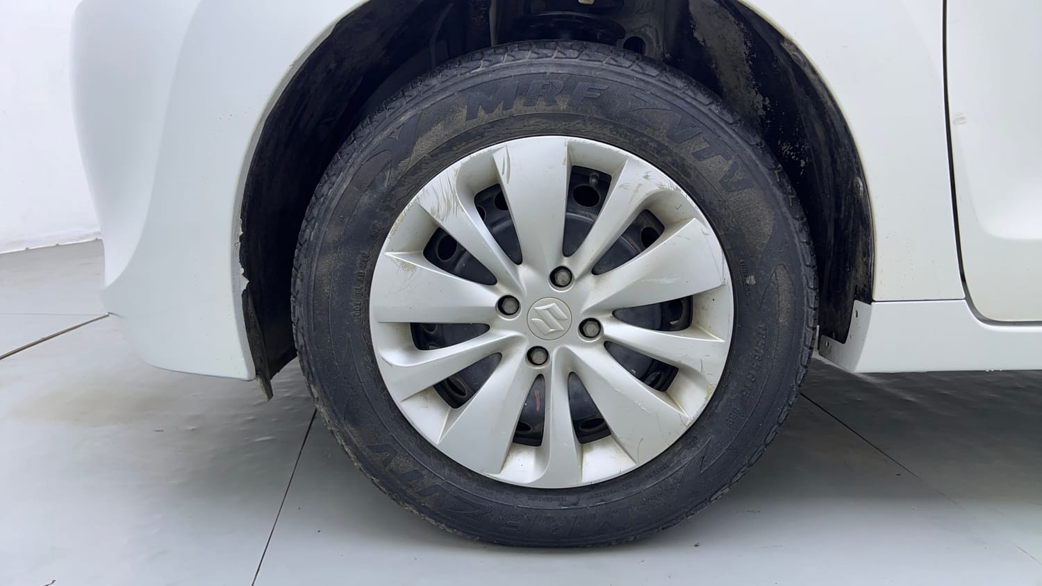 Used 2018 Maruti Suzuki Baleno Delta 1.2 Petrol Manual tyres LEFT FRONT TYRE RIM VIEW