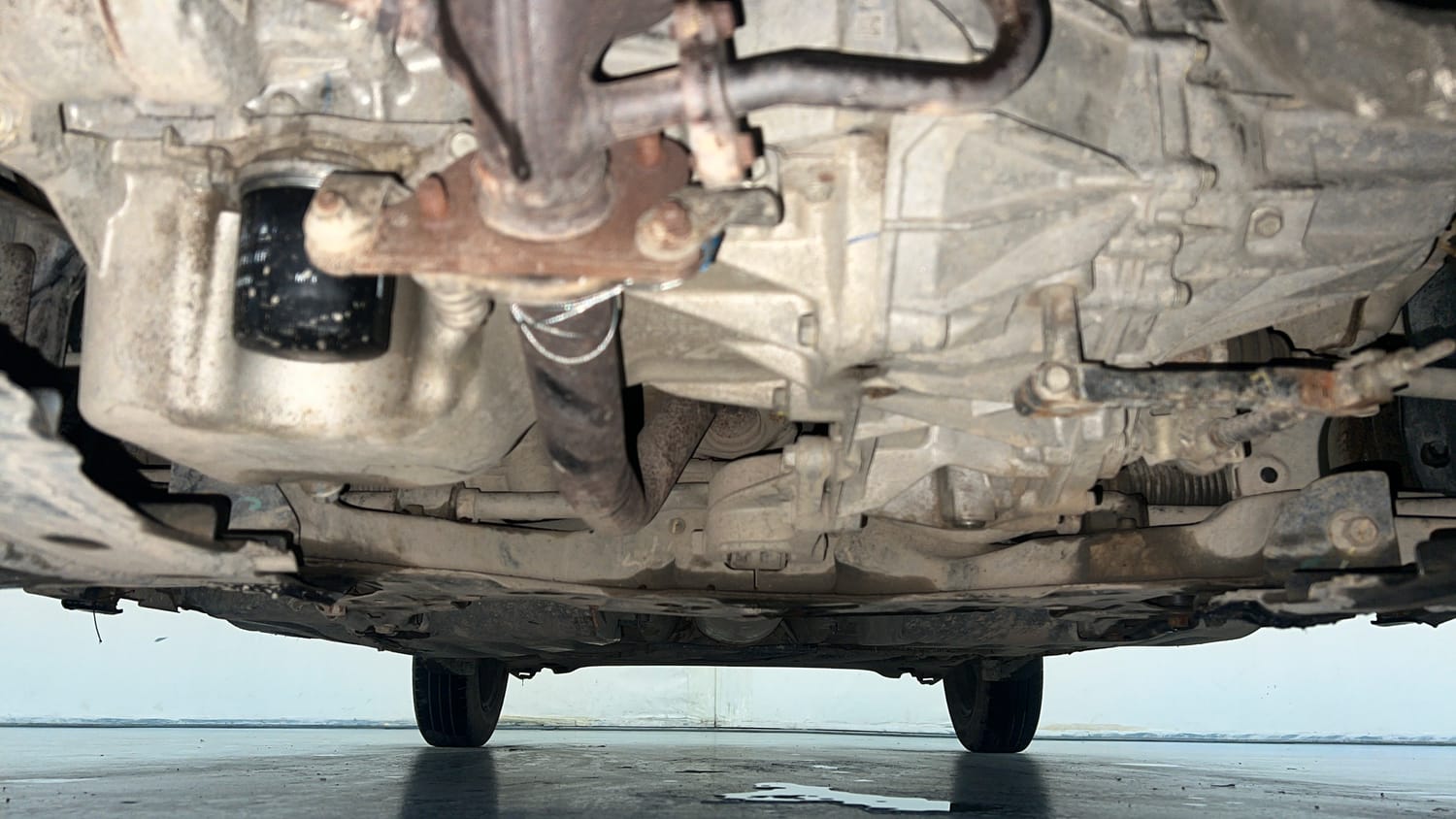 Used 2021 Maruti Suzuki Dzire VXi Petrol Manual extra FRONT LEFT UNDERBODY VIEW