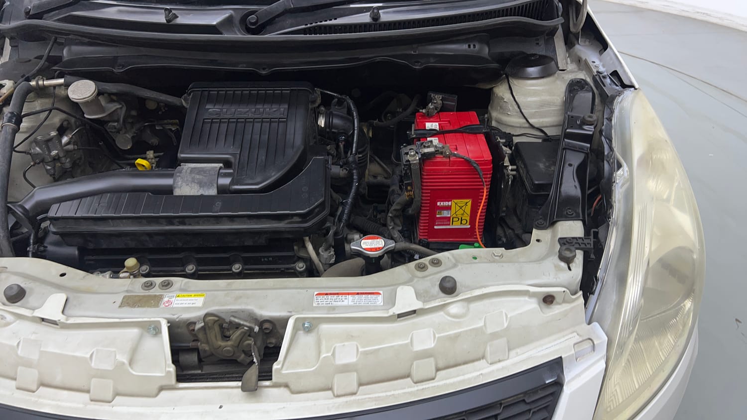 Used 2017 Maruti Suzuki Swift Lxi (O) Petrol Manual engine ENGINE LEFT SIDE VIEW