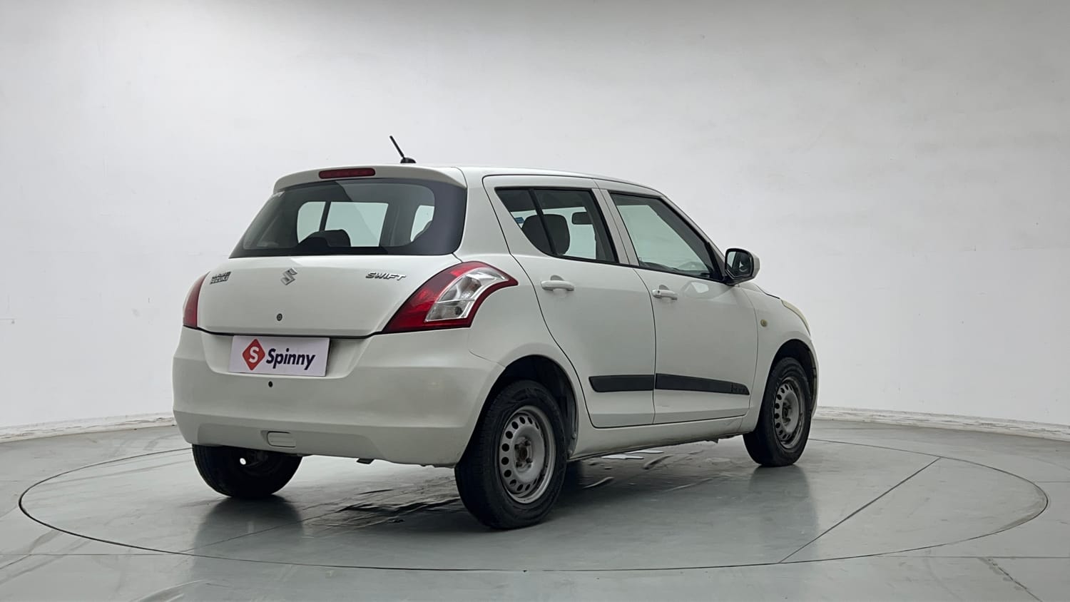 Used 2017 Maruti Suzuki Swift Lxi (O) Petrol Manual exterior RIGHT REAR CORNER VIEW