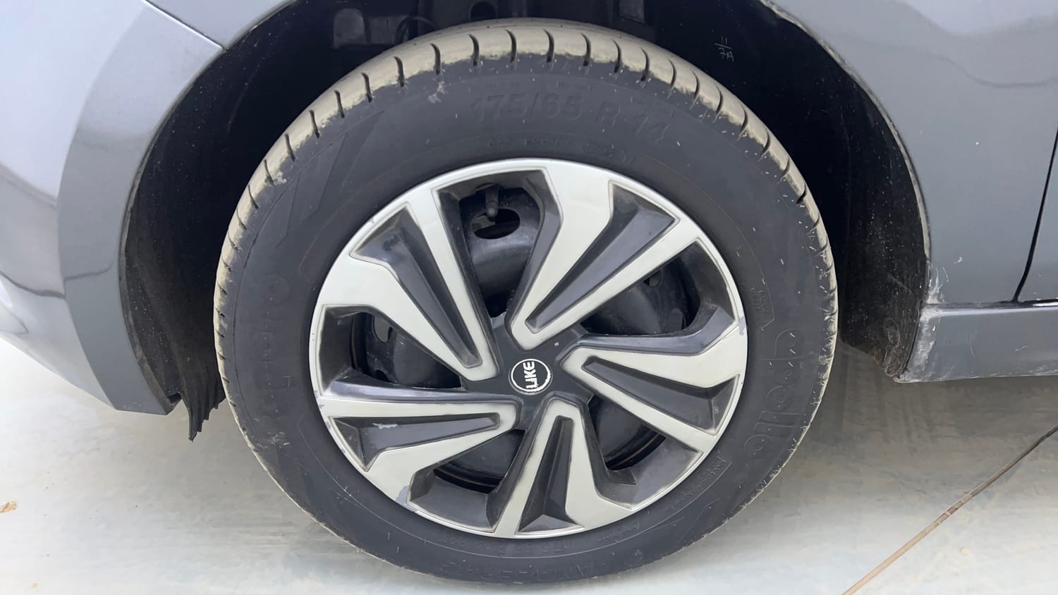 Used 2022 Tata Tigor XMA Petrol Automatic tyres LEFT FRONT TYRE RIM VIEW