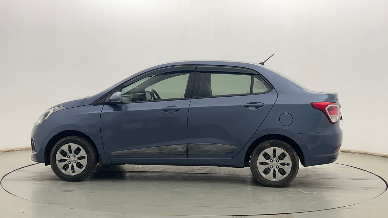 Used 2015 Hyundai Xcent S 1.2 Petrol Manual exterior LEFT SIDE VIEW