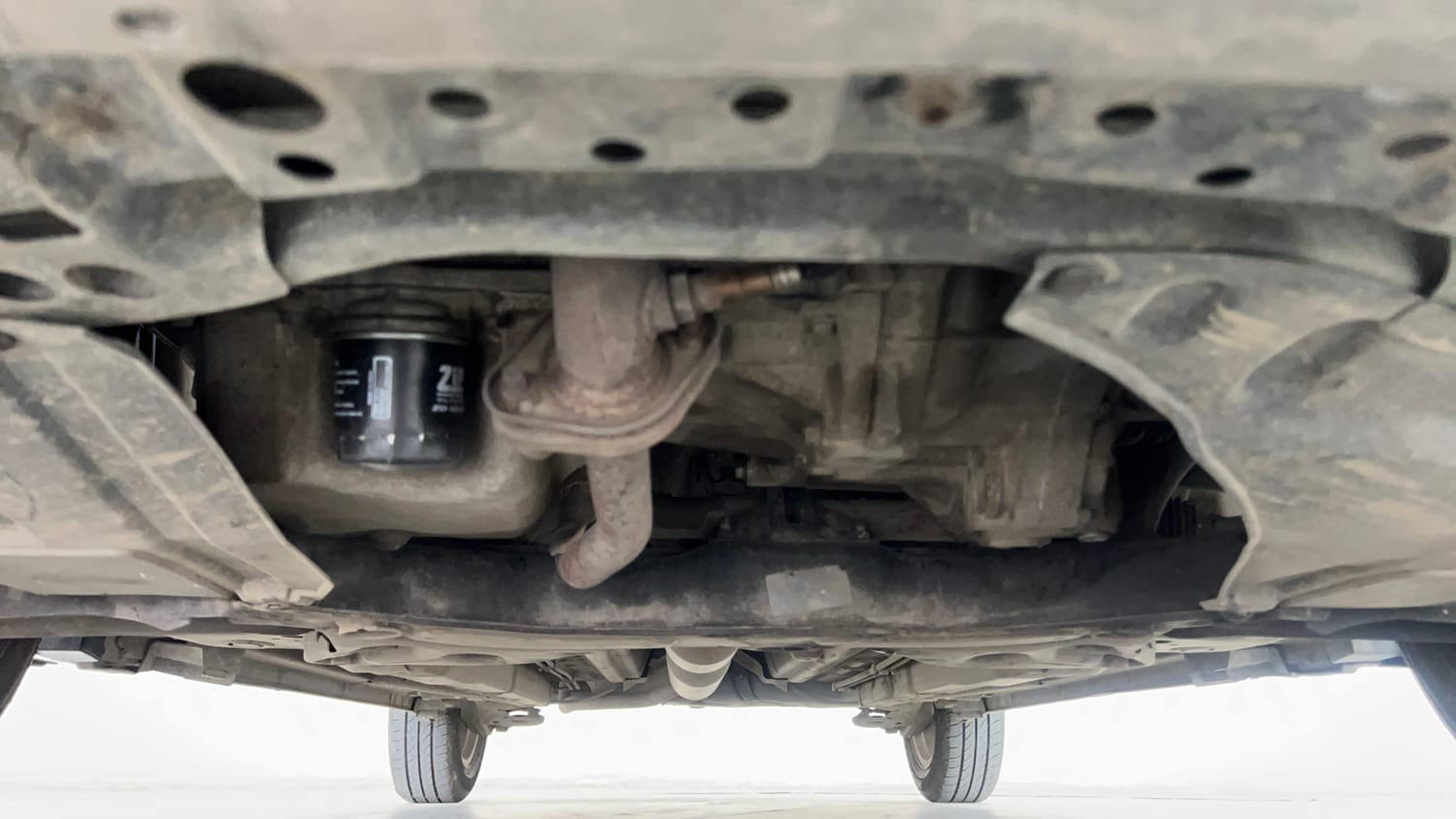 Used 2014 Maruti Suzuki Swift Dzire ZXI Petrol Manual extra FRONT LEFT UNDERBODY VIEW