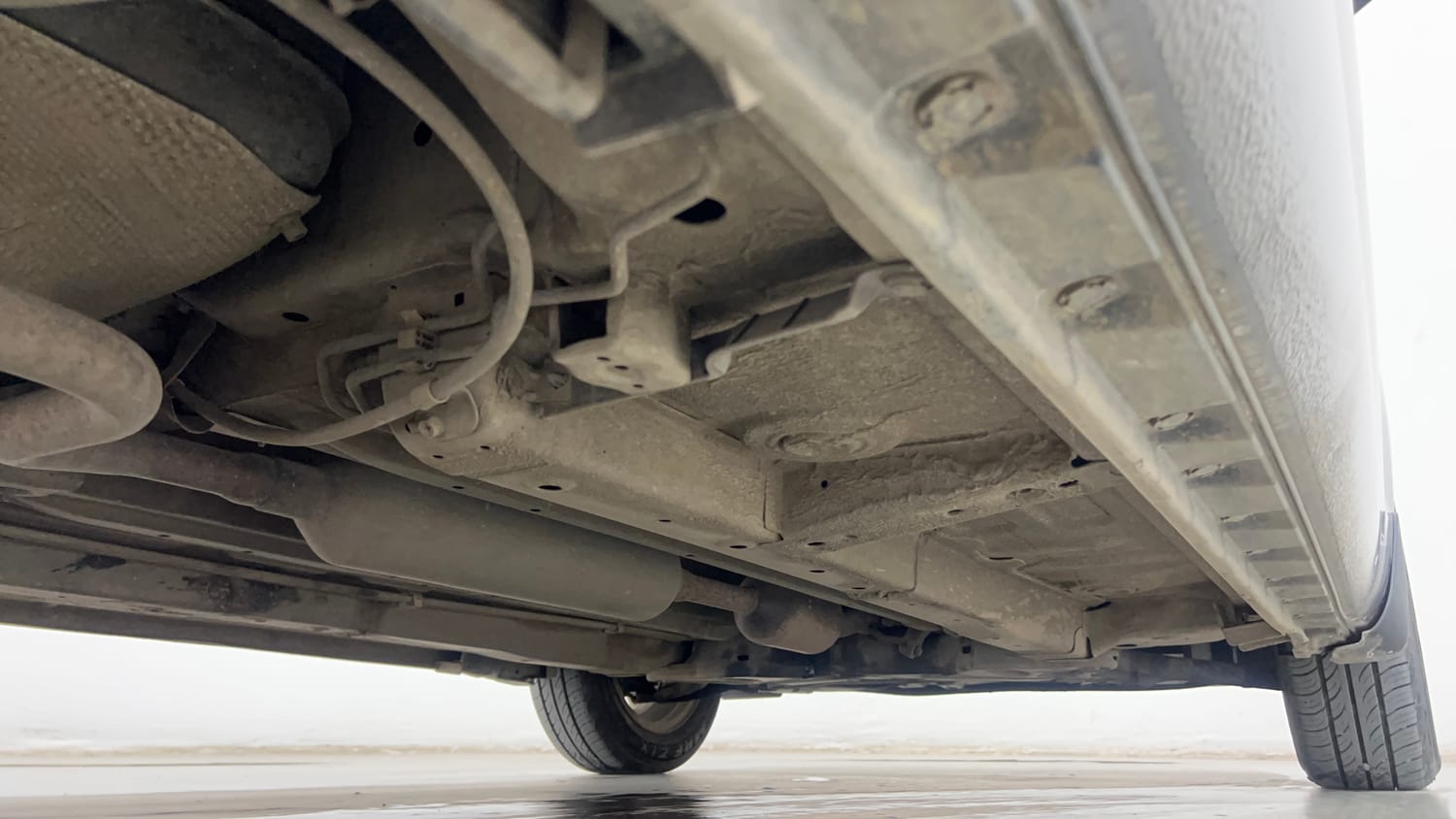 Used 2014 Maruti Suzuki Swift Dzire ZXI Petrol Manual extra REAR RIGHT UNDERBODY VIEW