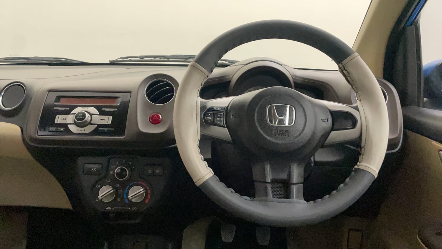 Used 2013 Honda Brio VX MT Petrol Manual interior STEERING VIEW