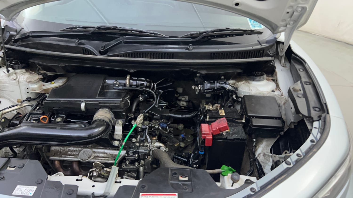 Used 2024 Maruti Suzuki Fronx Delta Plus (O) 1.2L MT Petrol Manual engine ENGINE LEFT SIDE HINGE & APRON VIEW