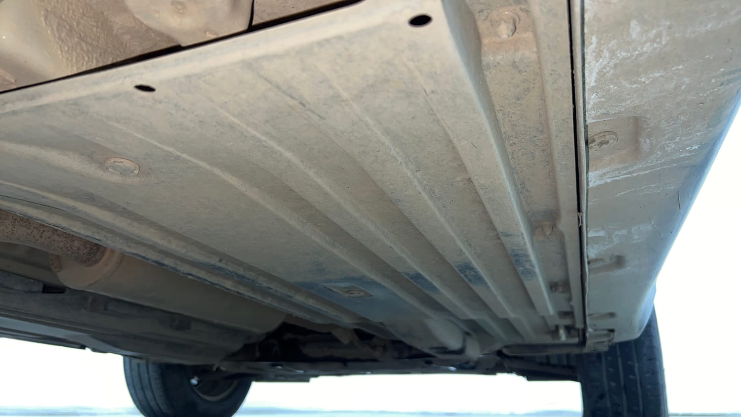 Used 2022 Maruti Suzuki Brezza VXi Petrol Manual extra REAR RIGHT UNDERBODY VIEW