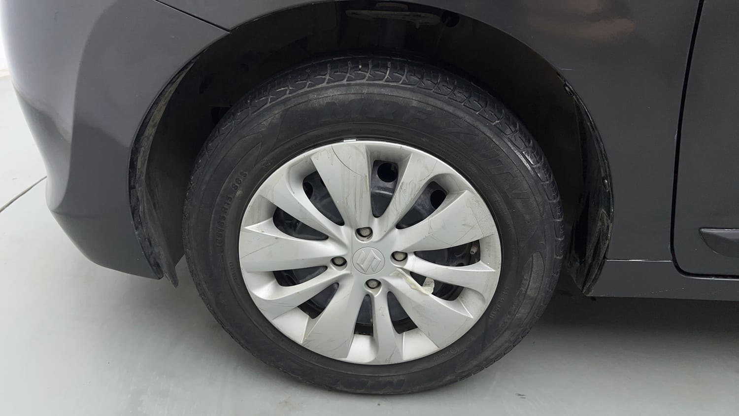 Used 2018 Maruti Suzuki Baleno Delta 1.2 Petrol Manual tyres LEFT FRONT TYRE RIM VIEW