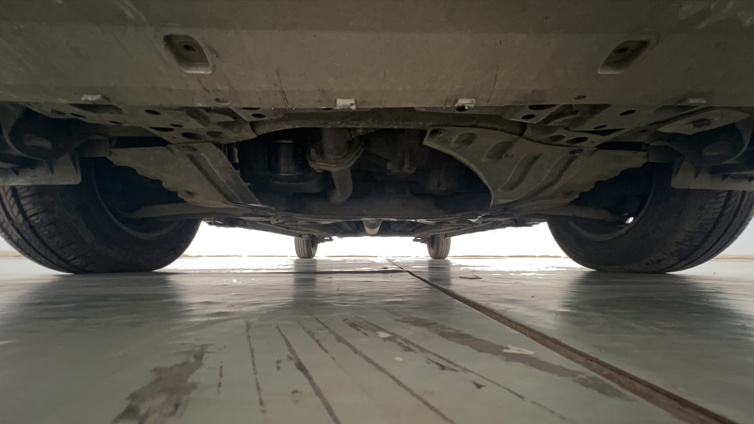 Used 2013 Maruti Suzuki Swift VXi Petrol Manual extra FRONT LEFT UNDERBODY VIEW