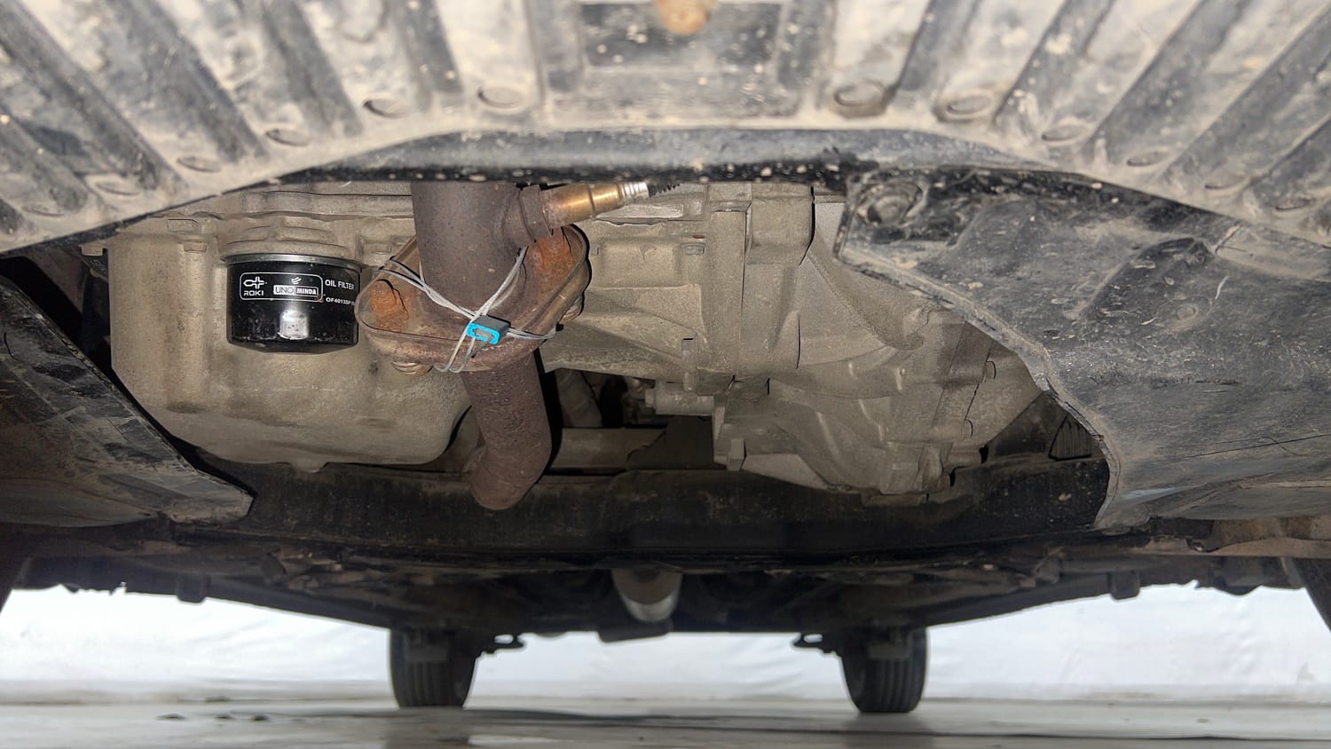 Used 2015 Maruti Suzuki Ciaz ZXI+ Petrol Manual extra FRONT LEFT UNDERBODY VIEW