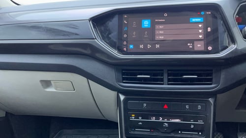 Used 2023 Volkswagen Taigun Topline 1.0 TSI MT Petrol Manual interior MUSIC SYSTEM & AC CONTROL VIEW