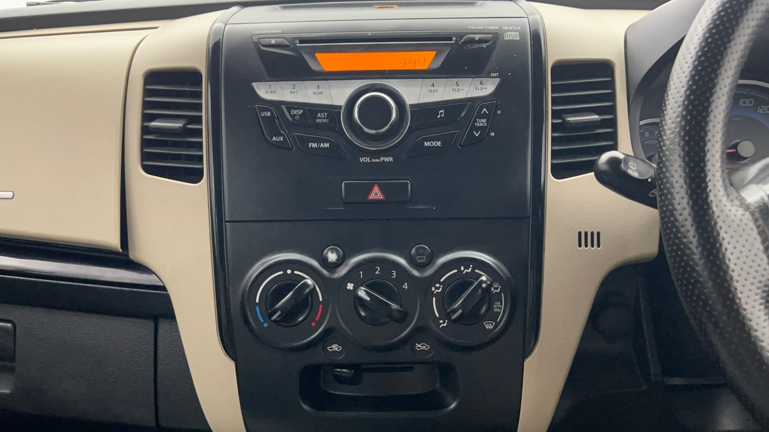 Used 2018 Maruti Suzuki Wagon R 1.0 VXI AMT (O) Petrol Automatic top_features Integrated (in-dash) music system