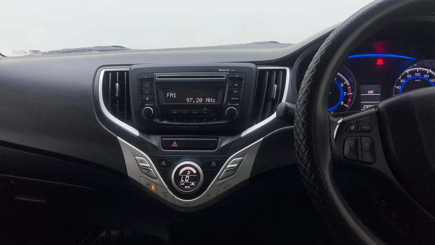 Used 2017 Maruti Suzuki Baleno Delta 1.2 Petrol Manual interior MUSIC SYSTEM & AC CONTROL VIEW