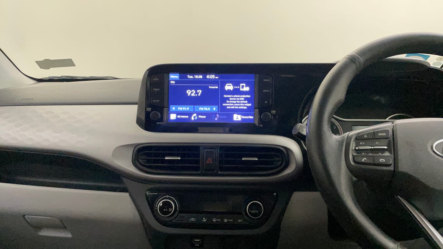 Used 2022 Hyundai Grand i10 Nios Sportz AMT 1.2 Kappa VTVT Petrol Automatic interior MUSIC SYSTEM & AC CONTROL VIEW