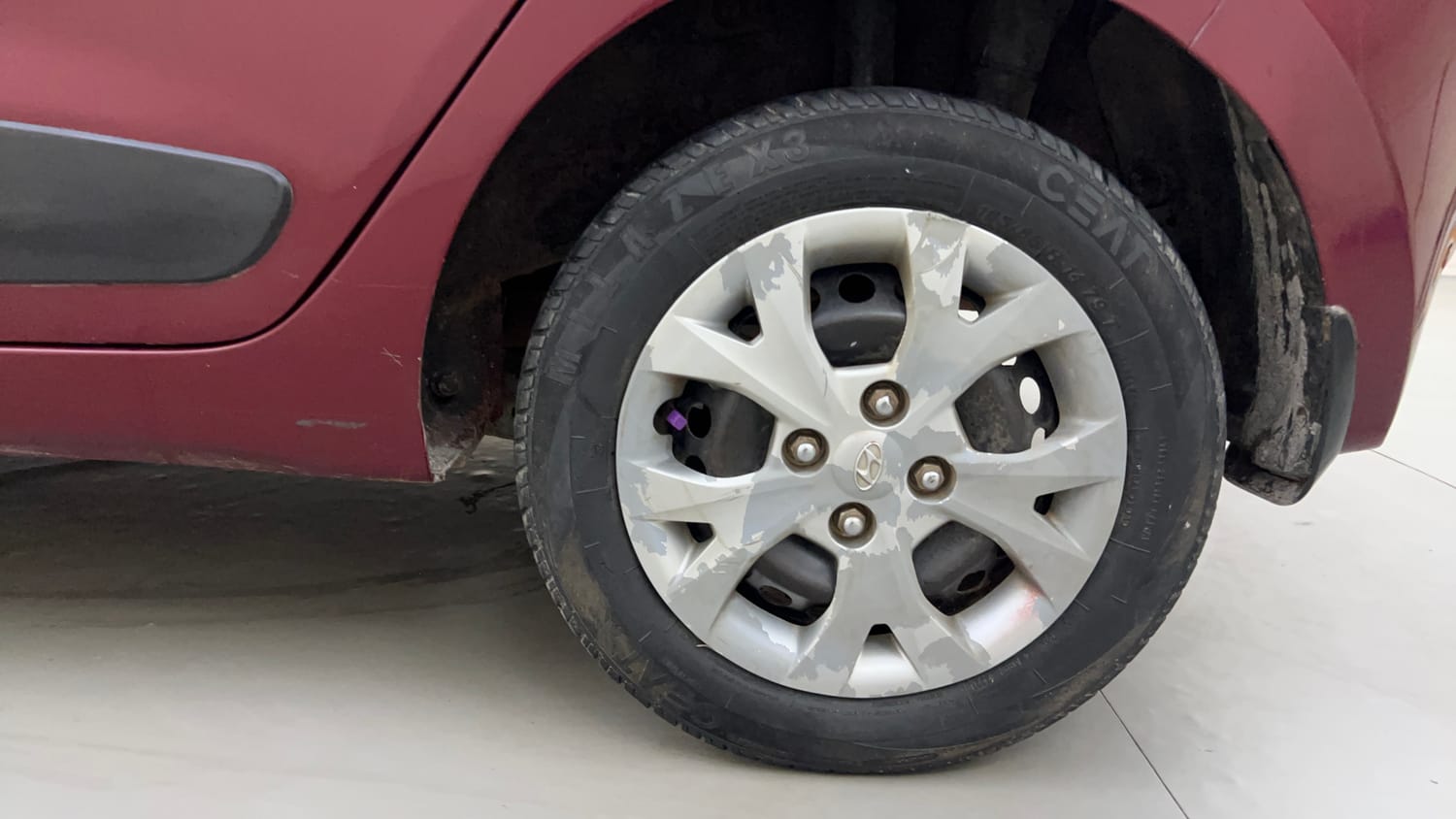 Used 2016 Hyundai Grand i10 Sportz 1.2 Kappa VTVT Petrol Manual tyres LEFT REAR TYRE RIM VIEW