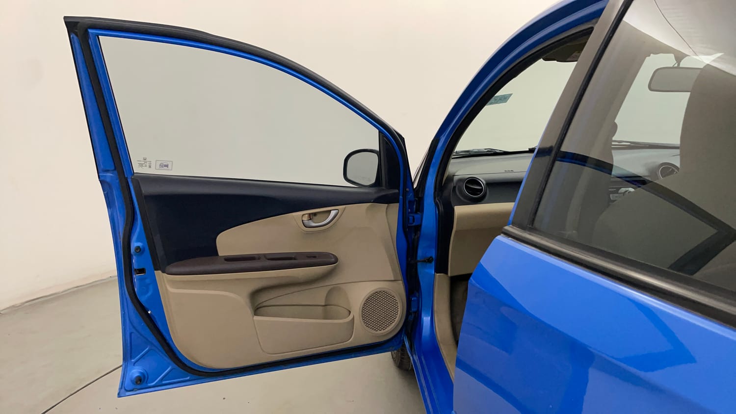 Used 2013 Honda Brio VX MT Petrol Manual interior LEFT FRONT DOOR OPEN VIEW
