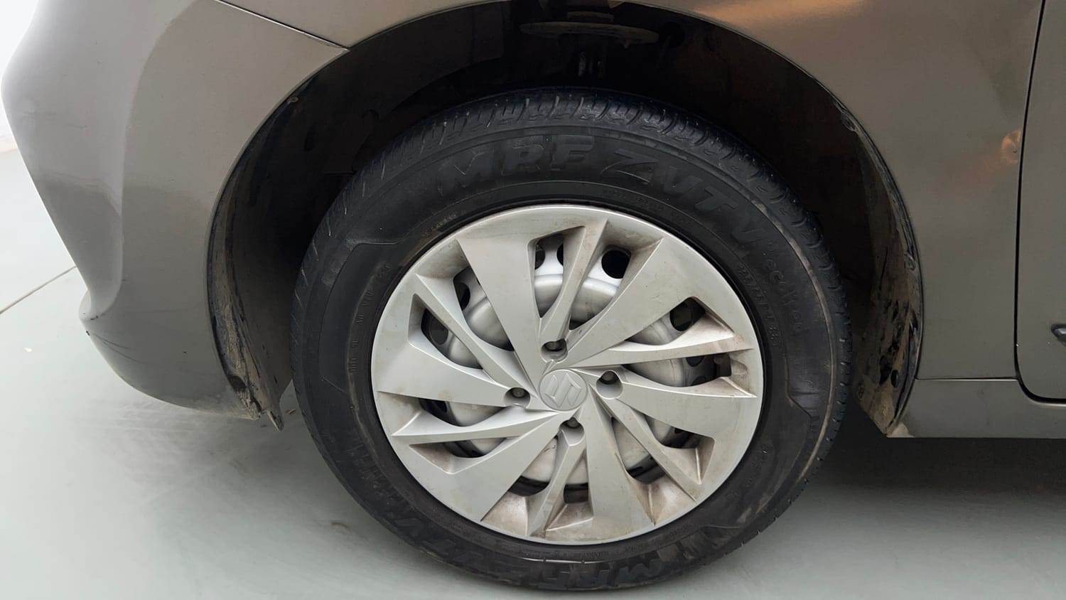 Used 2021 Maruti Suzuki Baleno Sigma Petrol Manual tyres LEFT FRONT TYRE RIM VIEW