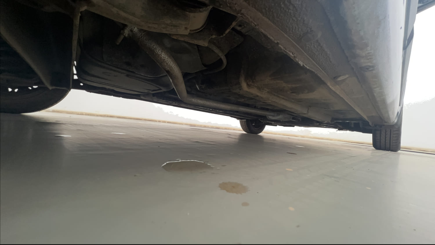 Used 2015 Hyundai Xcent S 1.2 Petrol Manual extra REAR RIGHT UNDERBODY VIEW