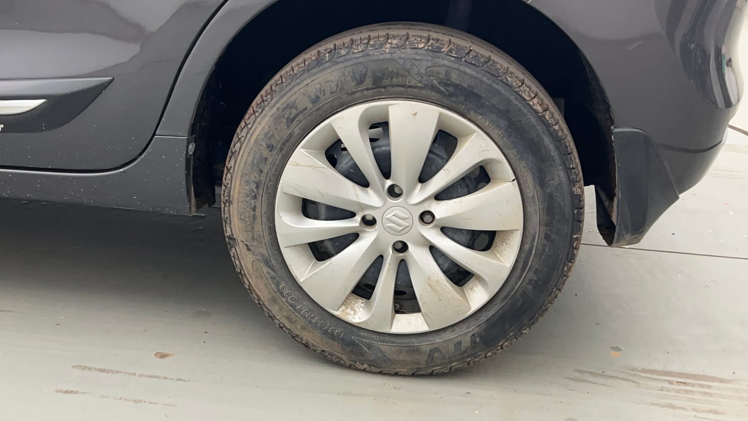Used 2018 Maruti Suzuki Baleno Delta 1.2 Petrol Manual tyres LEFT REAR TYRE RIM VIEW