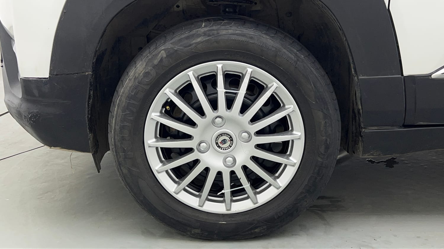 Used 2022 Maruti Suzuki Brezza VXi Petrol Manual tyres LEFT FRONT TYRE RIM VIEW