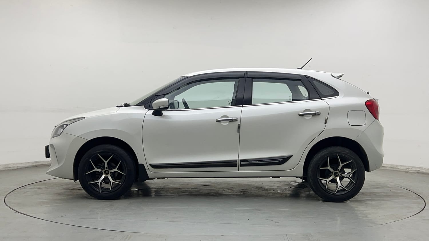 Used 2021 Maruti Suzuki Baleno Delta Petrol Manual exterior LEFT SIDE VIEW