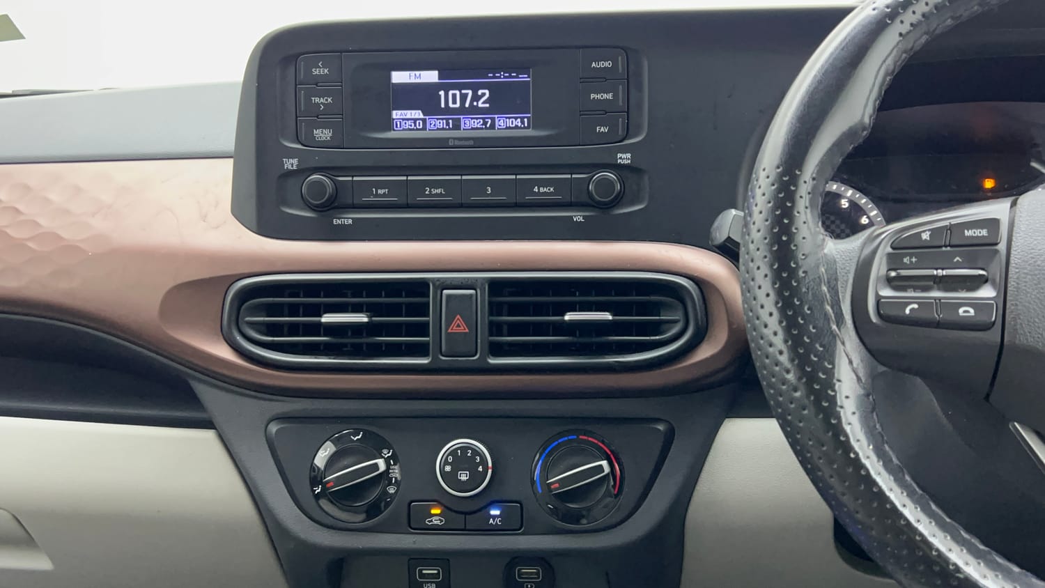 Used 2021 Hyundai Aura S 1.2 AMT Petrol Petrol Automatic interior MUSIC SYSTEM & AC CONTROL VIEW