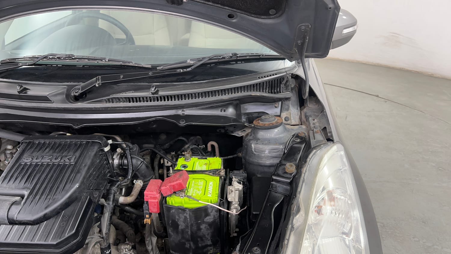 Used 2014 Maruti Suzuki Swift Dzire ZXI Petrol Manual engine ENGINE LEFT SIDE HINGE & APRON VIEW