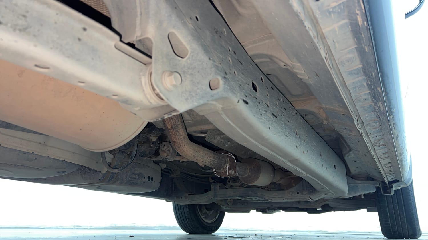 Used 2022 Toyota Innova Crysta GX 2.7 AT 7 STR Petrol Automatic extra REAR RIGHT UNDERBODY VIEW