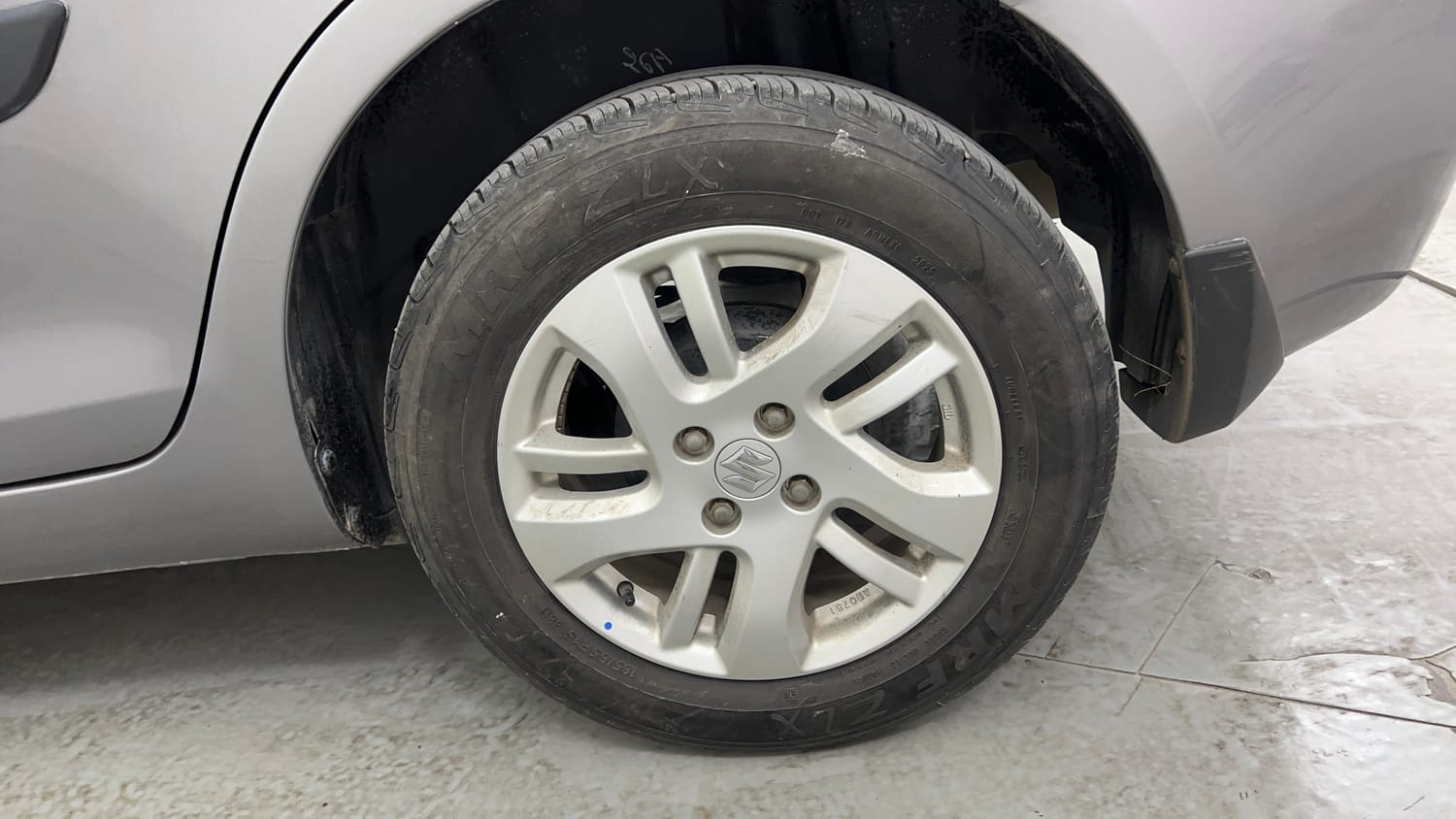 Used 2014 Maruti Suzuki Swift Dzire ZXI Petrol Manual tyres LEFT REAR TYRE RIM VIEW
