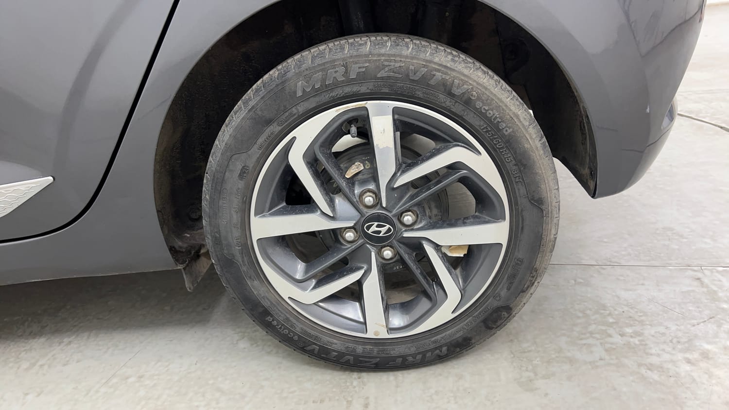Used 2021 Hyundai Grand i10 Nios Sportz AMT 1.2 Kappa VTVT Petrol Automatic tyres LEFT REAR TYRE RIM VIEW