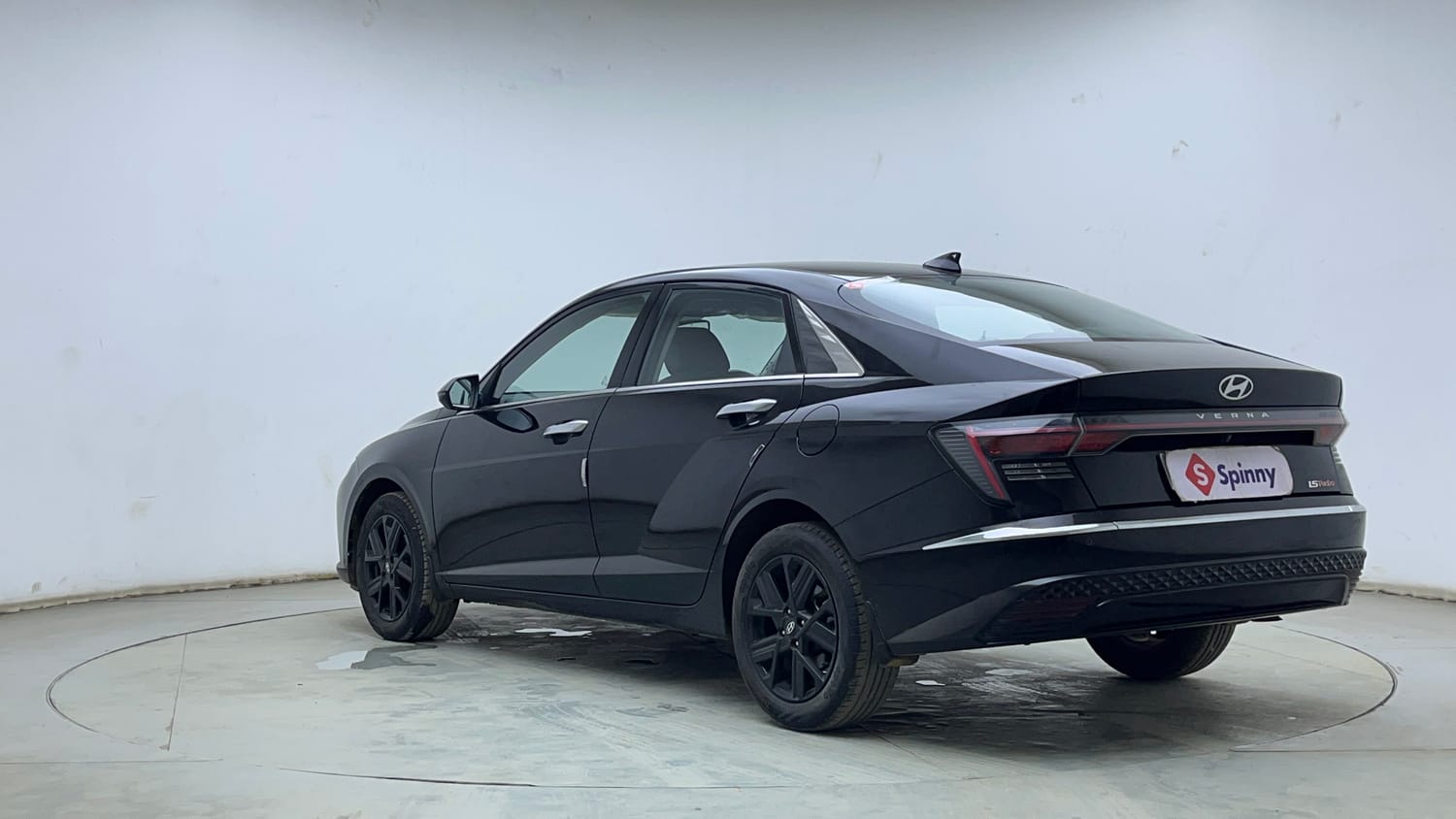 Used 2024 Hyundai Verna SX (O) 1.5 Turbo Petrol DCT Petrol Automatic exterior LEFT REAR CORNER VIEW